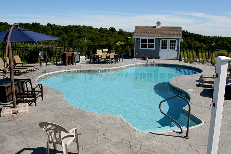 Swimming pool and stamped concrete project example 88